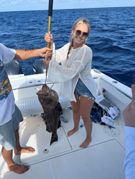 Aniston with a Grouper