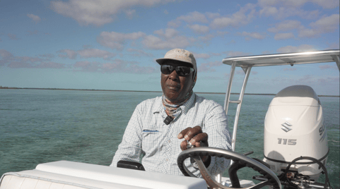 Capt Prescott driving boat